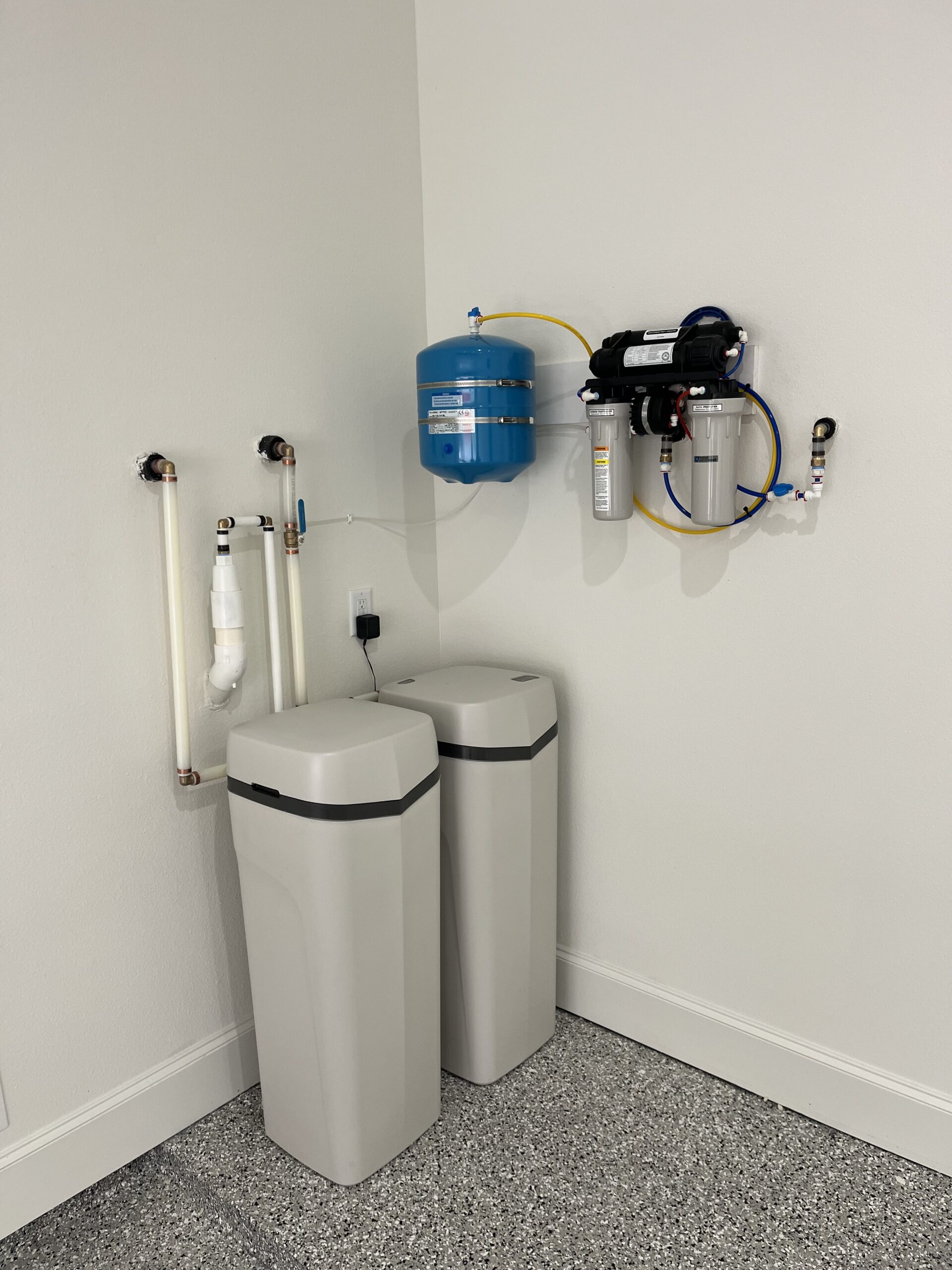 Clean city water flowing into a drinking glass